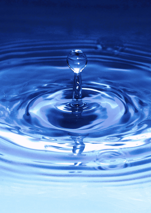 Hero image for the Reflections newsletter: Water drop ripple